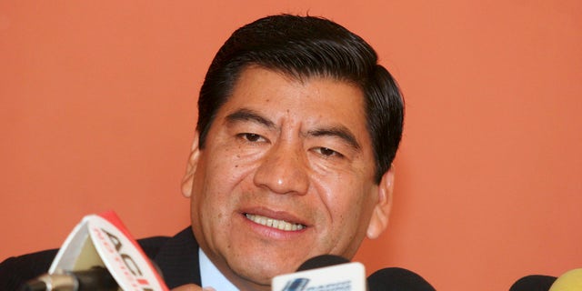 In this Feb. 15, 2006, file photo, the governor of the Mexican state of Puebla, Mario Marin, speaks during a news conference in Puebla, Mexico. Mexican authorities arrested on Feb. 3, 2021, the former governor on charges that he had a reporter who investigated his role in a pedophilia ring illegally arrested and tortured, an official said Thursday, Feb. 4, 2021. (AP Photo/Joel Merino, File)