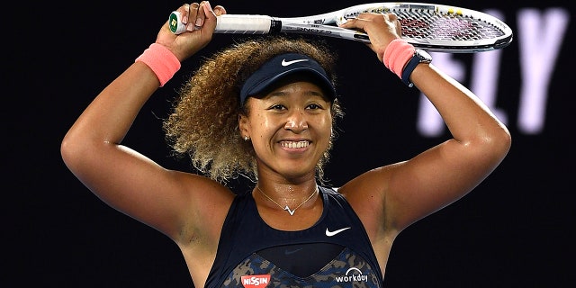 Japan's Naomi Osaka celebrates after defeating United States' Jennifer Brady during the women's singles final at the Australian Open tennis championship in Melbourne, Australia, Saturday, Feb. 20, 2021. (Associated Press)