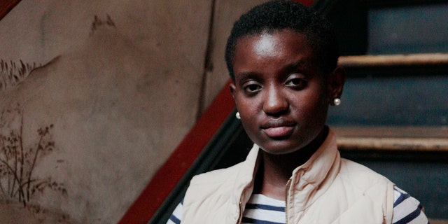 Oumou Kanoute, a student at Smith College, poses for a portrait at Haymarket Cafe in Northampton, Mass., on Sep. 13, 2018. Kanoute, 21, a former cross-country runner and the first in her family to go to college, drew national attention after a college employee called the campus police because she seemed to be out of place while eating lunch and relaxing in a common area. She believes she was targeted because she was Black. Nearly two months after Kanoute wrote about her encounter with the Smith campus police on her Facebook page and posted a video of the incident that went viral, her life on campus is markedly different, as she guards her privacy after weeks of public exposure. (Photo by Michael Swensen for The Boston Globe via Getty Images)