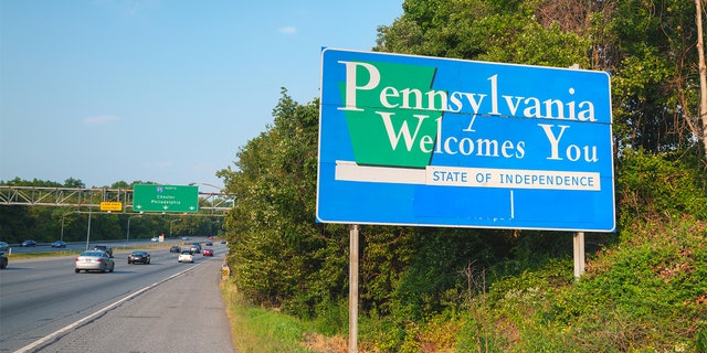 The road sign 'Pennsylvania Welcomes You' at the state border on Interstate 95 in Marcus Hook.