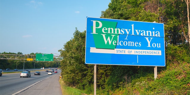 The road sign 'Pennsylvania Welcomes You' at the state border on Interstate 95 in Marcus Hook.