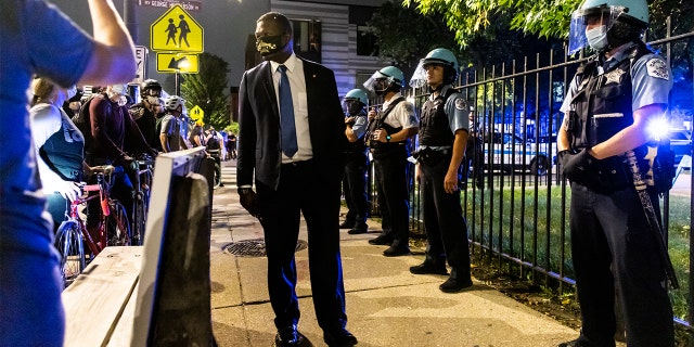 Members of the Chicago Police Department confronted protesters during a march for Breonna Taylor on September 23, 2020 in Chicago, Illinois. (Photo by Natasha Moustache/Getty Images)