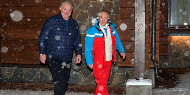 Russian President Vladimir Putin, right, and Belarusian President Alexander Lukashenko walk during their meeting at the Black Sea resort of Sochi, Russia, Monday, Feb. 22, 2021. Putin hosted his Belarusian counterpart Alexander Lukashenko for talks on Monday, amid media reports suggesting that the leader of Belarus was coming to Russia to secure one more loan. (Alexei Druzhinin, Sputnik, Kremlin Pool Photo via AP)