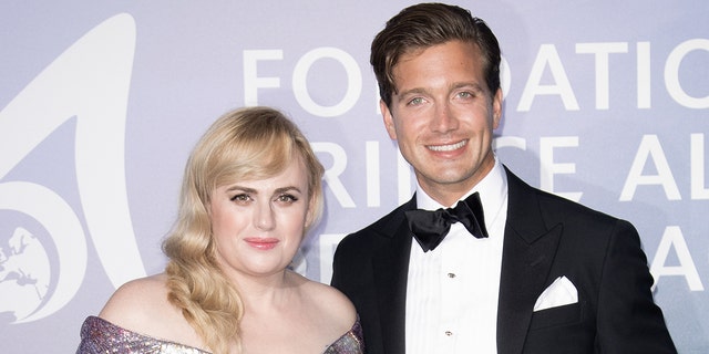 Rebel Wilson (left) and Jacob Busch (right) have reportedly split after several months of dating.  (Photo by SC Pool - Corbis / Corbis via Getty Images)