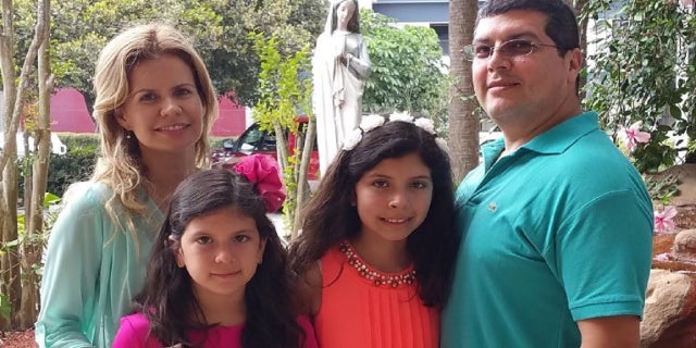 Rolando and Diana Vizcarra and their daughters (photo courtesy Rolando Vizcarra)