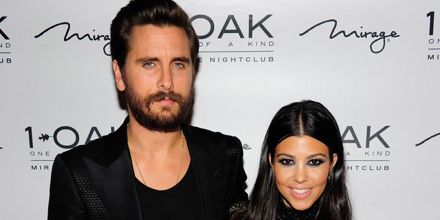 Kourtney Kardashian (right) was previously in a long-term relationship with Scott Disick (left), the father of her children. (Photo by Steven Lawton/FilmMagic)