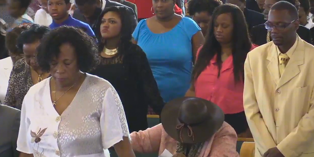Members of St. Barley Church in Huntsville, Alabama worship before the coronavirus pandemic began. (St. Bartley Church)