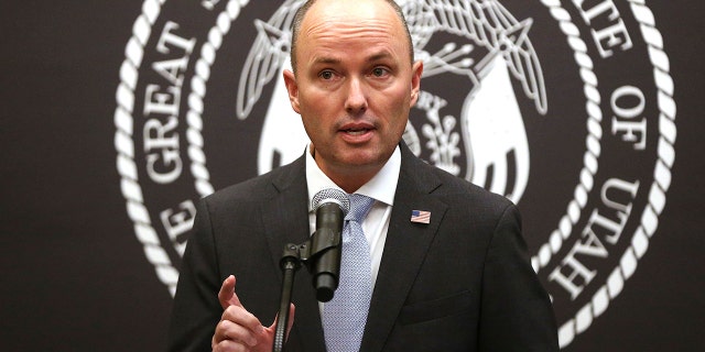 FILE - In this Jan. 8, 2021, file photo, Utah Gov. Spencer J. Cox speaks during a briefing at the Utah State Capitol in Salt Lake City. Cox said Thursday, Feb. 18, 2021, that he wouldn't yet be comfortable with signing the current version of a bill that would ban transgender girls from female sports, though he's continuing conversations with the sponsors. (Jeffrey D. Allred/Deseret News, via AP, Pool, File)