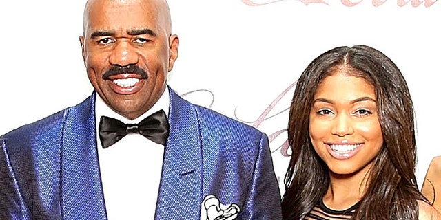 Lori Harvey (right) and her father Steve Harvey (left).  (Photo by Neilson Barnard / Getty Images)
