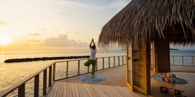 Nautilus Maldives has scheduled daily yoga, fitness, and meditation classes that are available free with private island purchases. (The Maldives Nautilus)