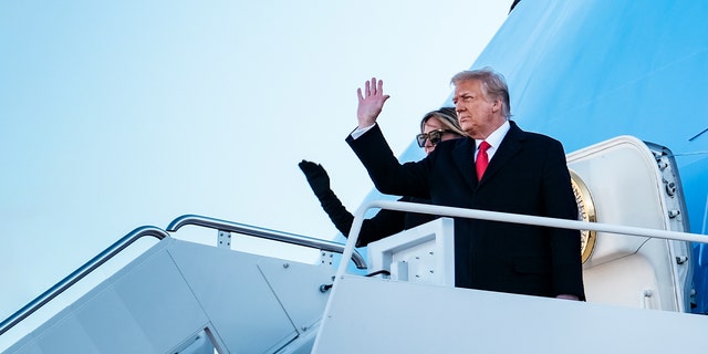 President Trump and first lady Melania Trump board Air Force One at Joint Base Andrews before boarding Air Force One for his last time as president on Jan. 20, 2021 in Joint Base Andrews, Maryland.