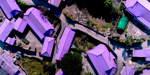Shades of the secondary hue dominate the isle in the South Jeolla Province, as seen across 400 purple rooftops.