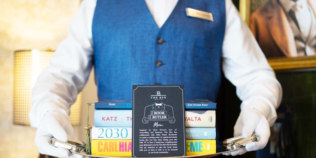 The Ben West Palm's Book Butler will hand deliver a complimentary book to guests as part of its new program, in partnership with The Palm Beach Book Store.