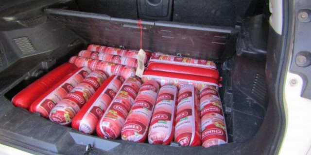 Contraband bologna found in a car at the border.