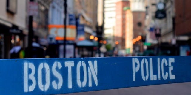 This generic image shows a police barricade at a Boston crime scene. 