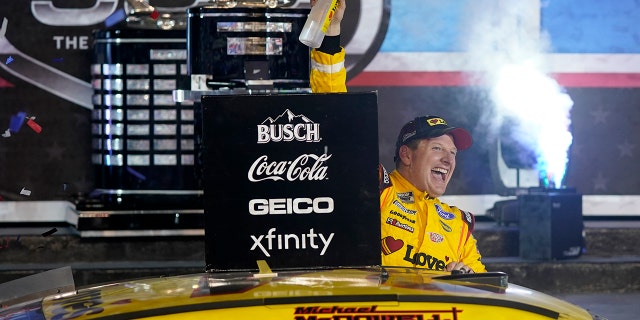 Michael McDowell celebrates after winning the NASCAR Daytona 500 auto race at Daytona International Speedway on Monday, February 15, 2021, in Daytona Beach, Fla. (AP Photo / John Raoux)