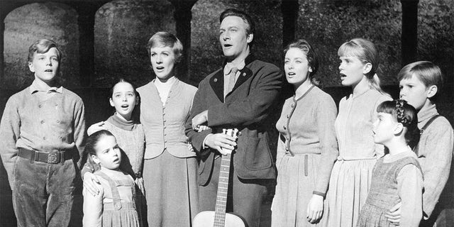 The actors playing members of the Von Trapp family in a promotional portrait for "The Sound Of Music," directed by Robert Wise, 1965. Left to right: Nicholas Hammond as Friedrich, Kym Karath as Gretl, Angela Cartwright as Brigitta, Julie Andrews as Maria, Christopher Plummer as Captain Von Trapp, Charmian Carr as Liesl, Heather Menzies as Louisa, Debbie Turner as Marta and Duane Chase as Kurt.