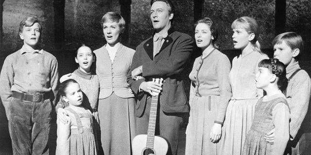 The actors playing members of the Von Trapp family in a promotional portrait for "The Sound Of Music," directed by Robert Wise, 1965. Left to right: Nicholas Hammond as Friedrich, Kym Karath as Gretl, Angela Cartwright as Brigitta, Julie Andrews as Maria, Christopher Plummer as Captain Von Trapp, Charmian Carr as Liesl, Heather Menzies as Louisa, Debbie Turner as Marta and Duane Chase as Kurt.