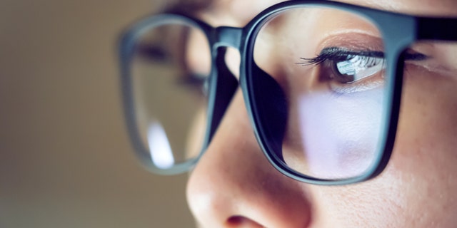 In a report published earlier this month on the pre-print site medRxiv, researchers said that those who wear glasses at least eight hours during the day are less likely to contract the novel disease because they touch their eyes less frequently than those who do not wear glasses. (iStock)