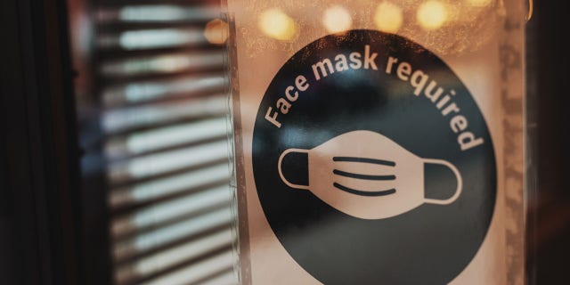 A stock photo for a business that requires face masks. The Biden administration missed a March 15 deadline it set for itself to issue a federal mandate on masks in workplaces.