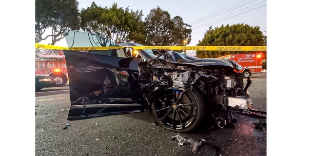 The driver of this black Lamborghini SUV sustained head injuries and was transported to a local hospital.