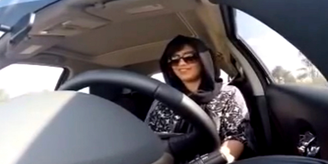 This Nov. 30, 2014, image made from video released by Loujain al-Hathloul shows her driving toward the United Arab Emirates - Saudi Arabia border before her arrest on Dec. 1, 2014, in Saudi Arabia. (AP/Loujain al-Hathloul)