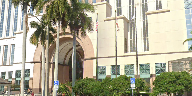 The flags outside of the Palm Beach County Courthouse. (Google Maps)