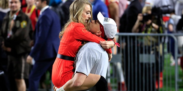 Patrick Mahomes #15 of the Kansas City Chiefs celebrates with his girlfriend, Brittany Matthews, after defeating the San Francisco 49ers 31-20 in Super Bowl LIV at Hard Rock Stadium on February 02, 2020 in Miami, Florida.