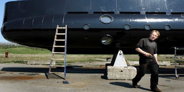 This 2008 file photo, shows Peter Madsen and his submarine. Madsen was sentenced to 21 months Tuesday for his attempt to escape from a suburban Copenhagen prison last year during which he threatened prison staff and police with a fake gun and fake explosives. (AP)