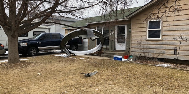 A large circular piece of the plane fell next to a house in Broomfield, Colorado.