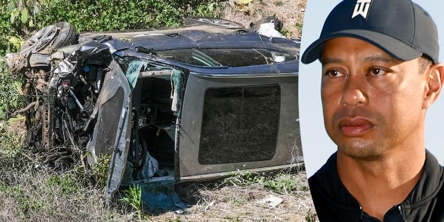 A vehicle rests on its side after a rollover accident involving golfer Tiger Woods along a road in the Rancho Palos Verdes suburb of Los Angeles on Tuesday, Feb. 23, 2021. Woods suffered leg injuries in the one-car accident and was undergoing surgery, authorities and his manager said. (AP Photo/Ringo H.W. Chiu)