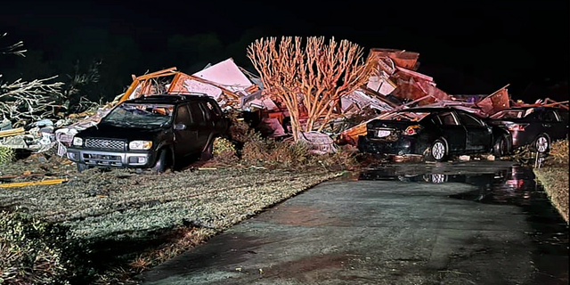 Damaged vehicles sit among debris after the tornado hit Brunswick County, N.C. (AP/Brunswick County Sheriff’s Office)