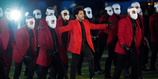 The Weeknd performs during halftime of the NFL Super Bowl 55 football game between the Kansas City Chiefs and the Tampa Bay Buccaneers on Sunday, February 7, 2021, in Tampa, Fla. 