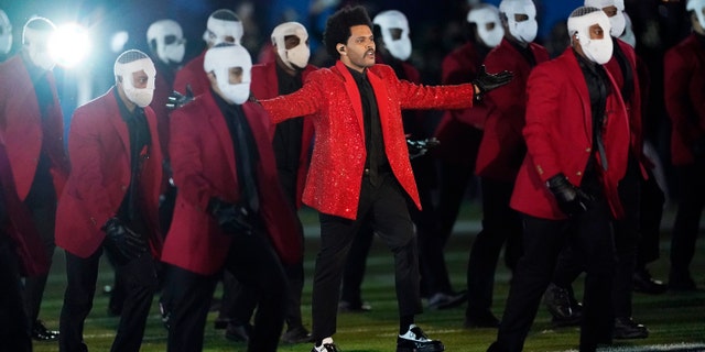 The Weeknd performs during the halftime show of the NFL Super Bowl 55 football game between the Kansas City Chiefs and Tampa Bay Buccaneers, Sunday, Feb. 7, 2021, in Tampa, Fla. 