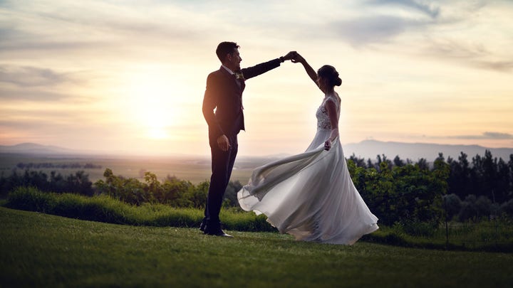 Indian couple weds in PPE after bride tests positive for COVID-19 before wedding