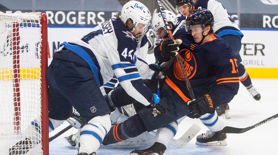 Wheeler, Scheifele help Jets edge Oilers