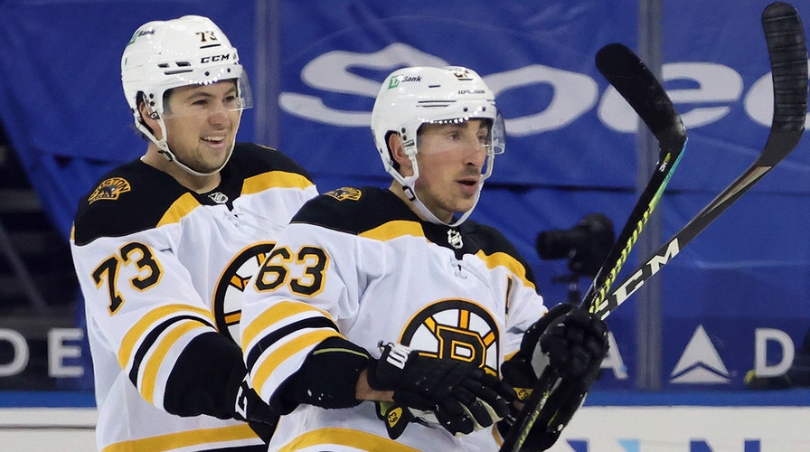 Charlie McAvoy's goal in season debut helps Bruins extend historic