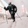 Steve Kent skis through Times Square during a snowstorm, Monday, Feb. 1, 2021, in the Manhattan borough of New York. (AP Photo/John Minchillo)