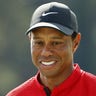 AUGUSTA, GEORGIA : Tiger Woods reacts after finishing on the 18th green during the final round of the Masters at Augusta National Golf Club on November 15, 2020 in Augusta, Georgia. (Photo by Patrick Smith/Getty Images)