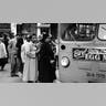 American civil rights activist Rosa Parks (center, in dark coat and hat) waits to board a bus at the end of the Montgomery bus boycott, Montgomery, Ala., Dec. 26, 1956.