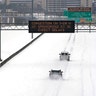 An electronic message board advises drivers of potential congestion on the intersecting interstate as they drive south on Interstate 55 in north Jackson, Miss., Monday, Feb. 15, 2021, as light snow mixed with sleet, and rain continue to cover much of the state. The National Weather Service forecasts temperatures barely hovering at 20 degrees Fahrenheit, and likely slipping into the single digits by Tuesday morning. A winter storm warning continues throughout the state.