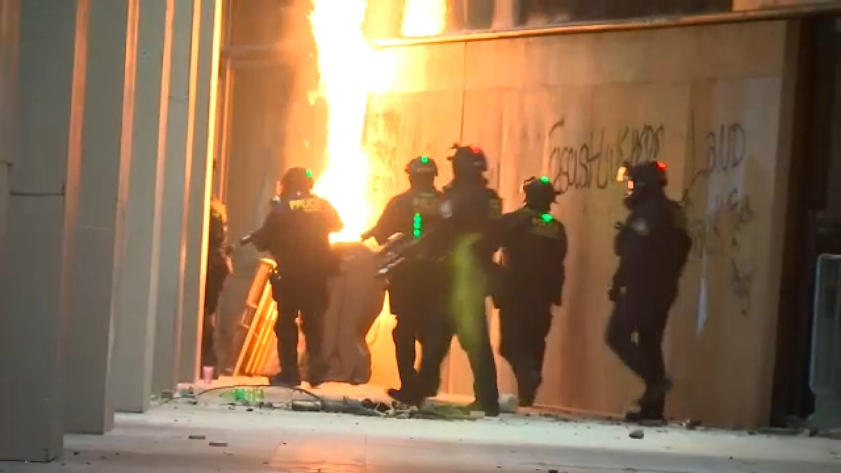 Law enforcement officers deployed in Portland, Oregon, on Thursday night. (FOX 12 Oregon)