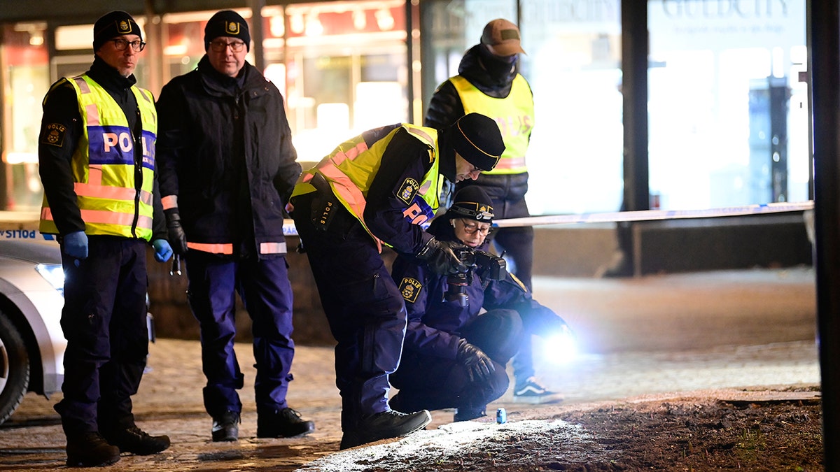 Police are seen in the area after several people were attacked in Vetlanda, Sweden, Wednesday, March 3, 2021. (Mikael Fritzon/TT News Agency via AP)