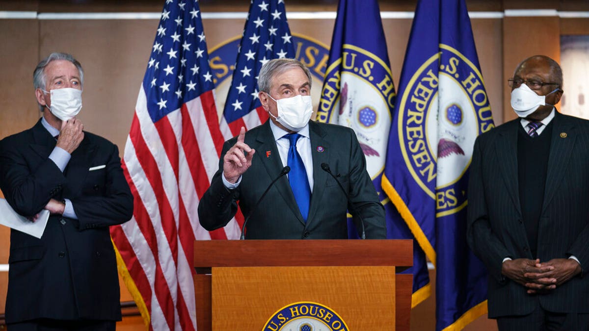 House Budget Committee Chairman John Yarmuth, D-Ky., center, is flanked by Ways and Means Committee Chairman Richard Neal, D-Mass., left, and Majority Whip James Clyburn, D-S.C., at a news conference ahead of the vote on the Democrat's $1.9 trillion COVID-19 relief bill, at the Capitol in Washington, Tuesday, March 9, 2021. Yarmuth said Tuesday Democrats are "assuming" they will have to pass all of President Biden's agenda through reconciliation. (AP Photo/J. Scott Applewhite)