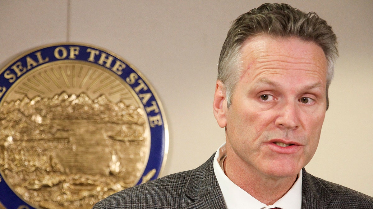 Alaska Gov. Mike Dunleavy speaks at a news conference in Anchorage, Alaska, on Sept. 27, 2019. (AP Photo/Mark Thiessen)