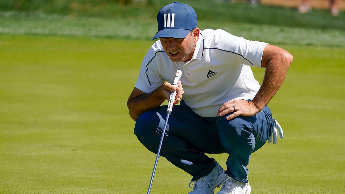 Sergio Garcia, of Spain, lines up a putt on the fifth hole during the first round of the The Players Championship golf tournament Thursday, March 11, 2021, in Ponte Vedra Beach, Fla.