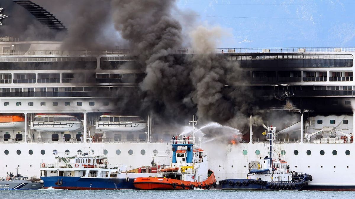 A fire broke out on the cruise ship docked in the port of Corfu as the 51 crew members on board were in good health, the coast guard said. (Stamatis Katopodis/InTime News via AP)