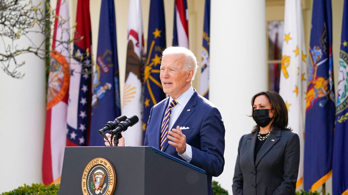President Joe Biden speaks about the American Rescue Plan, a coronavirus relief package, in the Rose Garden of the White House, Friday, March 12, 2021, in Washington. Vice President Kamala Harris is at right. (AP Photo/Alex Brandon)