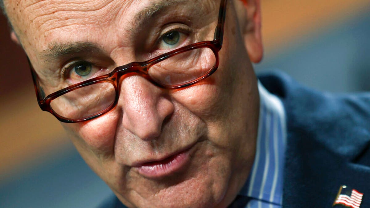 Senate Majority Leader Chuck Schumer of New York, holds a news conference, Thursday, March 25, 2021 on Capitol Hill in Washington.