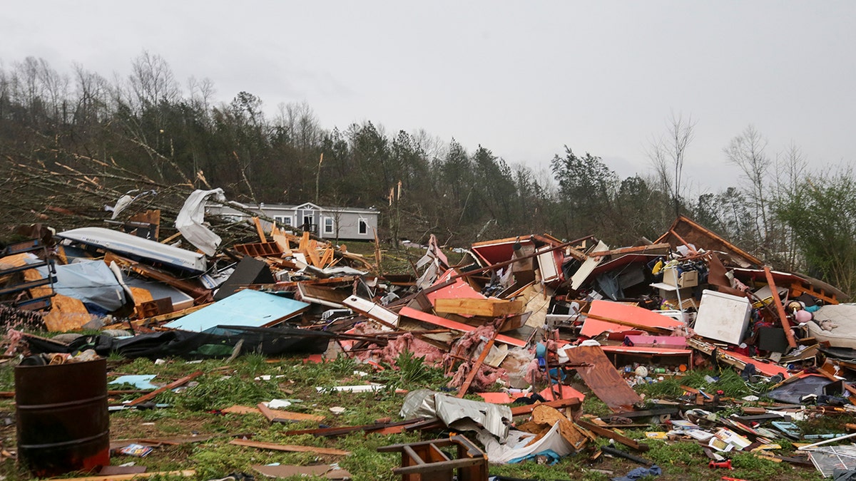 Piles of debris remain after a tornado touched down killing several people and damaging multiple homes Thursday, March 25, 2021 in Ohatchee, Ala. (Associated Press)